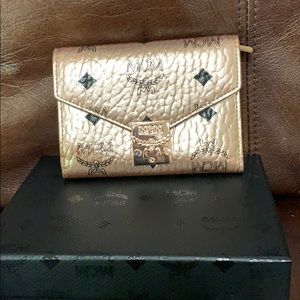 Brand new rose gold MCM trifold wallet